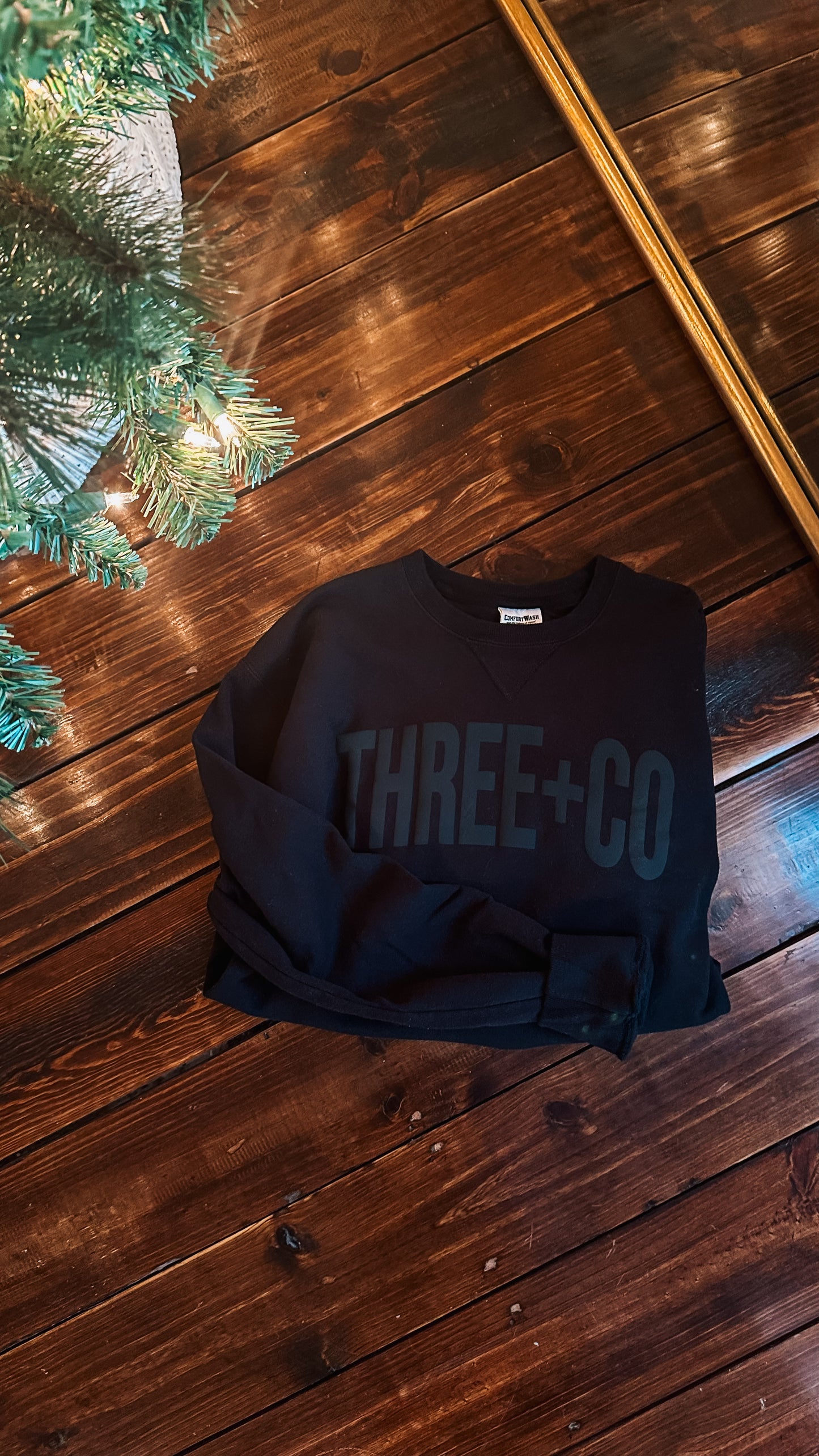 three + co branded sweatshirts