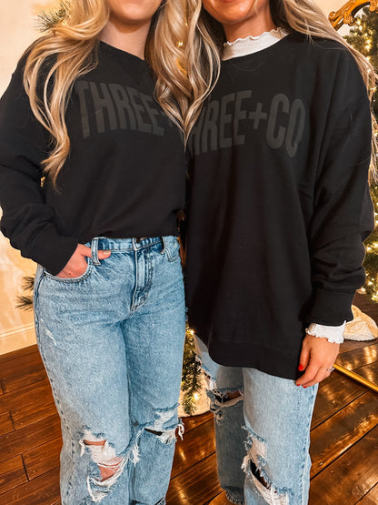 three + co branded sweatshirts