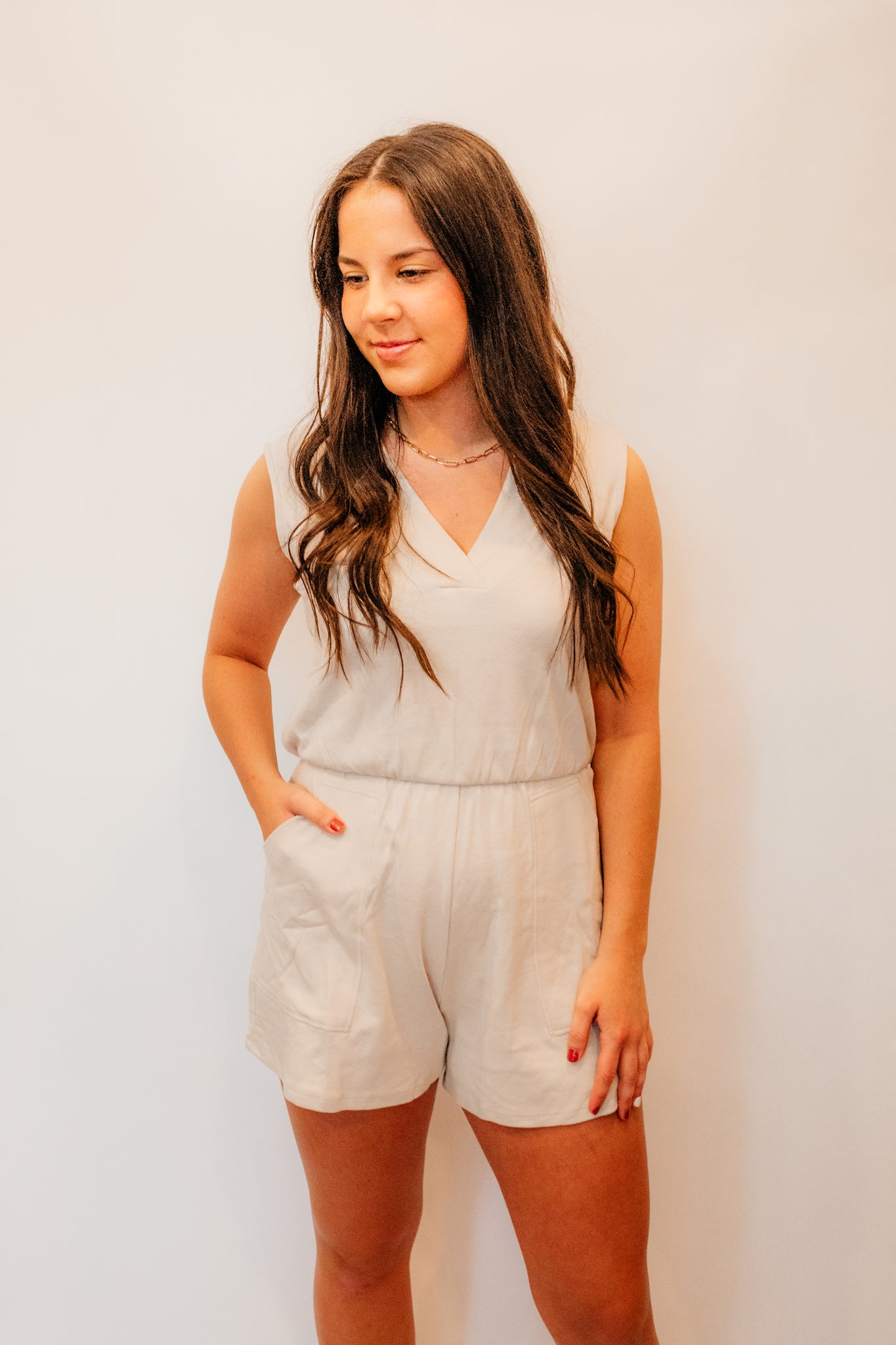 cream sleeveless cotton romper